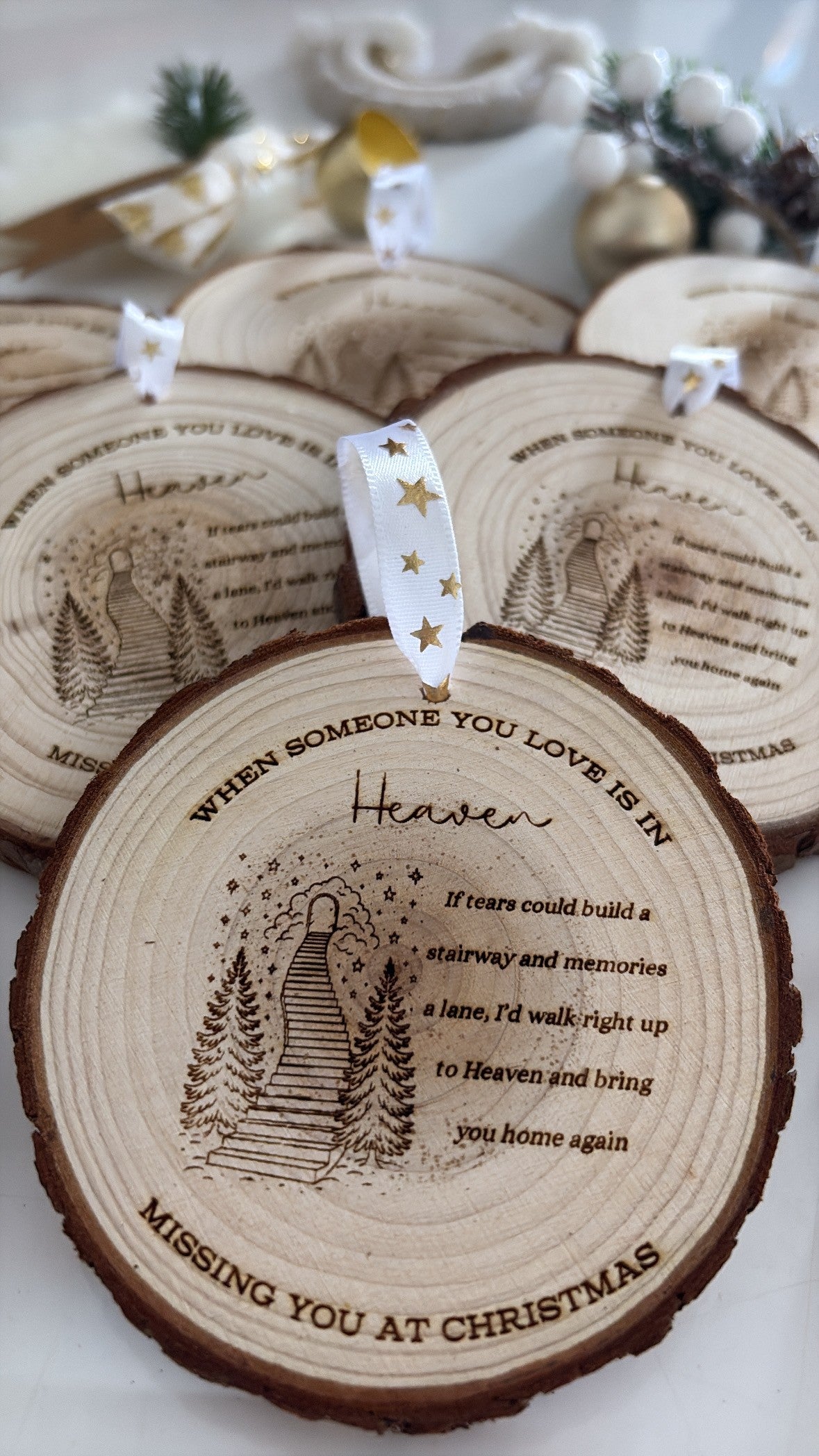 Engraved wooden ornament with “If tears could build a stairway” memorial quote and gold star ribbon