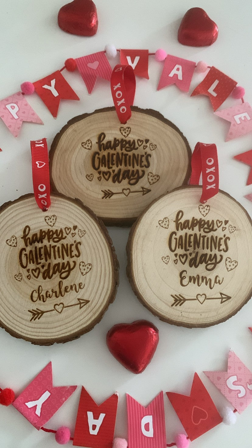 Happy Galentine’s Day wooden engraved disc with personalised name and red XOXO ribbon