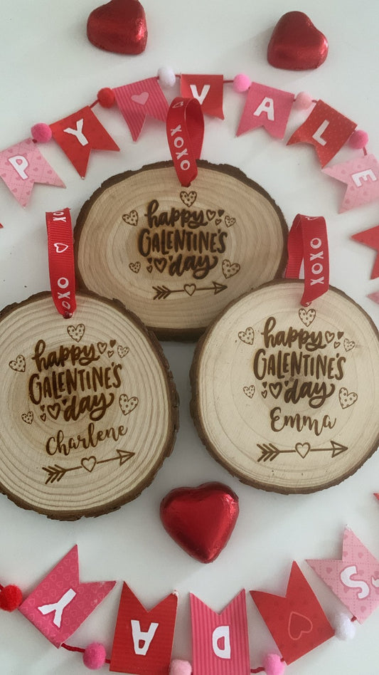 Happy Galentine’s Day wooden engraved disc with personalised name and red XOXO ribbon