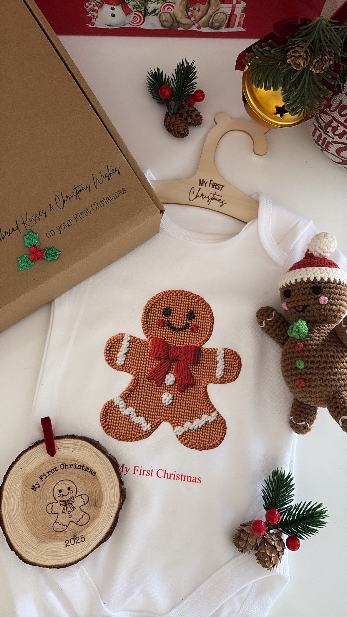 Gingerbread baby gift box with bodysuit, crochet toy, and My First Christmas 2025 ornament