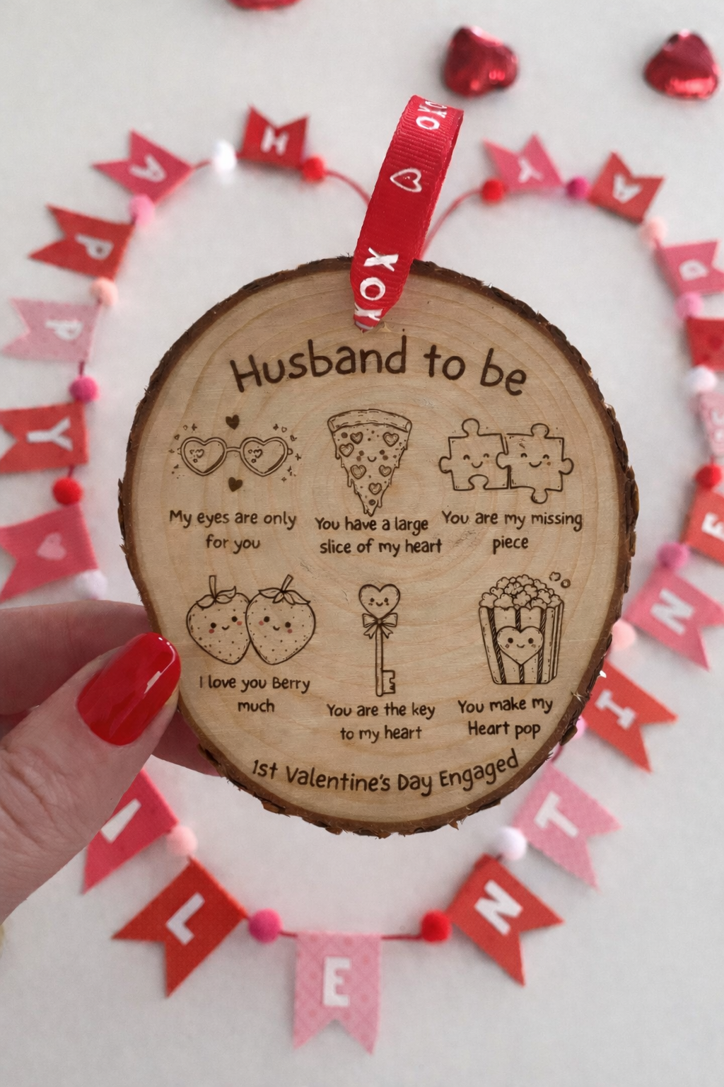 Engraved wooden Valentine decoration with cute love illustrations and hanging ribbon