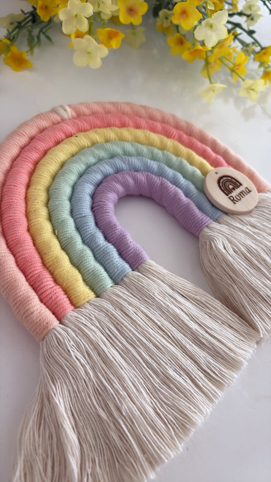 Personalised macramé rainbow in soft pastel colours — handmade baby gift and nursery keepsake