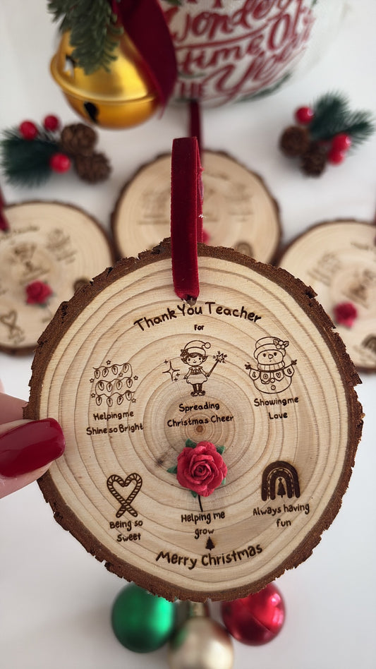 Personalised teacher Christmas gift — engraved wooden disc with festive illustrations and thank you message.